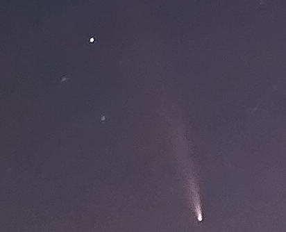 100% cropped image of the comet